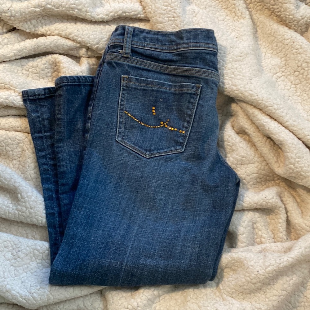 Capris with a few dazzles missing